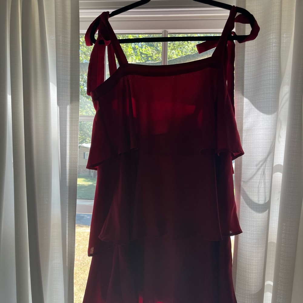 Tiered ruffle dress with self tying bow sleeves